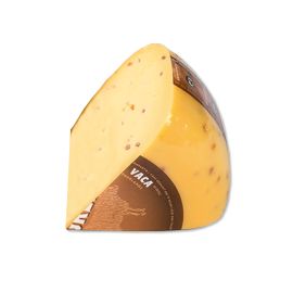 Piece of organic Gouda with fenugreek