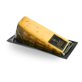 Morceau de fromage Fabulous Fenugreek dans son emballage