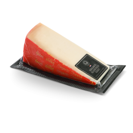 Morceau de fromage Glorious Goat dans son emballage