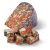"Red, white and blue colored cheese from Henri Willig with loose cheese cubes in front of it."