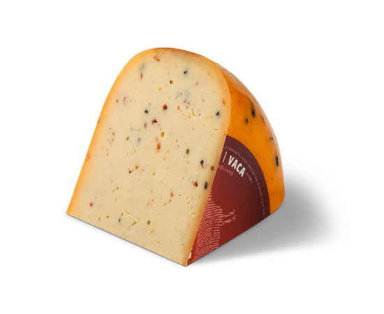 Morceau de Henri Willig fromage de vache aux herbes italiennes
