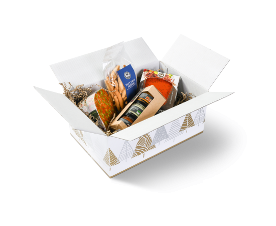 Une boîte blanche ouverte contenant divers produits (fromages) présentés à l’intérieur.