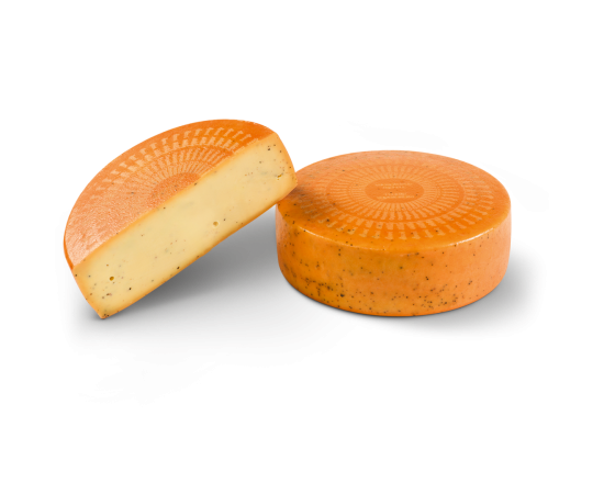 Halve en hele kaaswiel Bio Tremendous Truffle.
