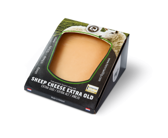 A piece of extra aged sheep cheese in the packaging