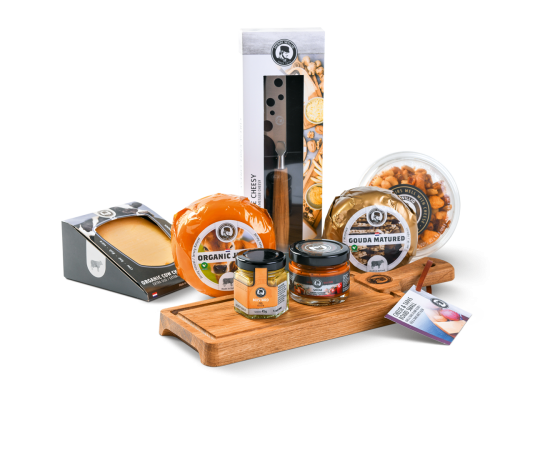 Various products, such as cheese, a cheese board and cheese knife, displayed to show what is included in the gift set.