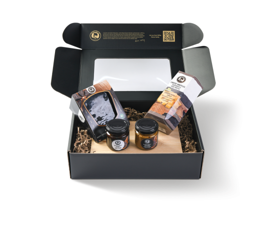 Cadeau de Noël Henri Willig avec produits à l’ail noir dans un coffret cadeau