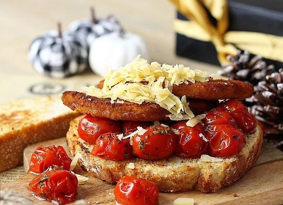 Sandwich with chicken schnitzel and cheese